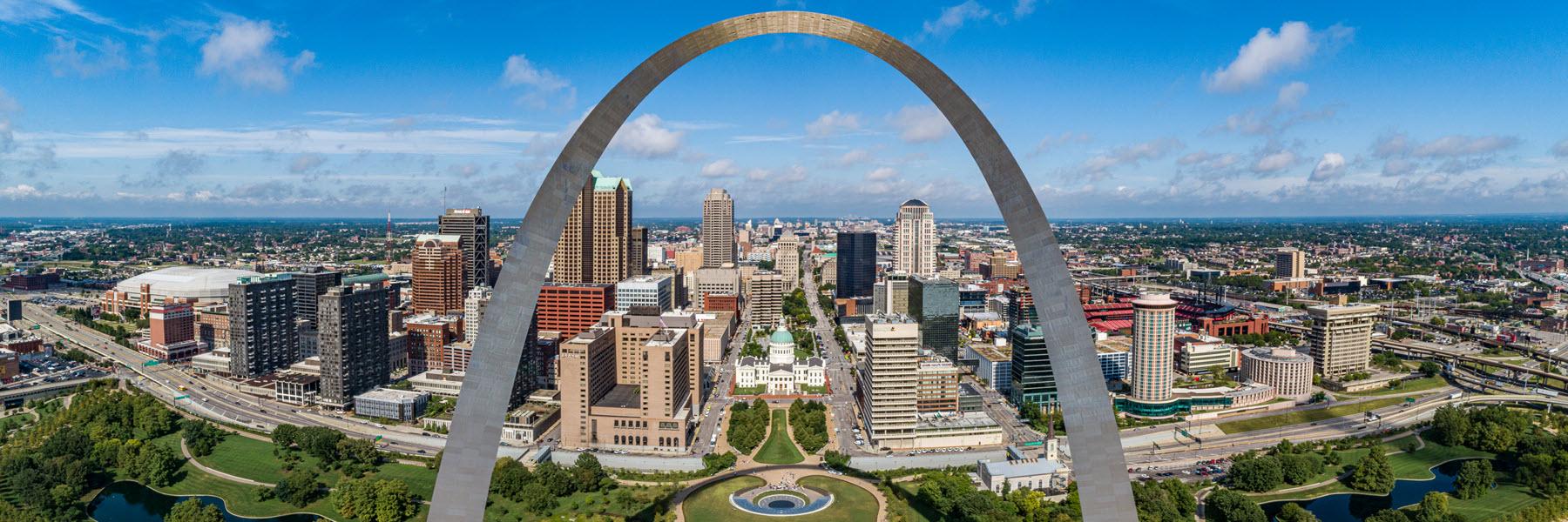 The Gateway Arch rises above the downtown St. Louis Skyline.